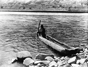 Maneuvering: Nez Perce canoe. Nez Perce man with pole ?