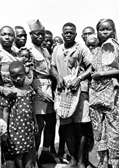 Mbira: A Ngbandi man playing the Ngombi bamboo noted mbira