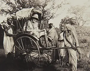 Sprung: Nigerian servants transporting a British official
