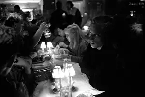 Oosterbroek: A night out. Patrons sitting at a table in a restaurant