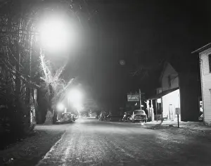 Electrification: Night scene in a newly electrified town somewhere