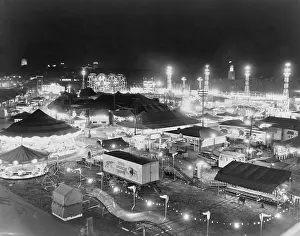 Topeka: Night view of the tents and rides at the ?