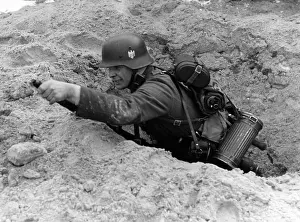Foxhole: Noncommissioned officer during a raid exercise, 1943