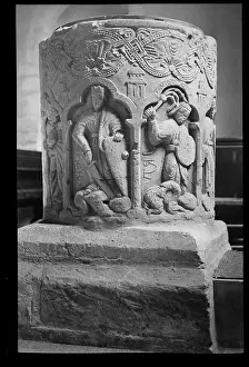 Trefoil: Norman font with intricate carved patterns and carvings