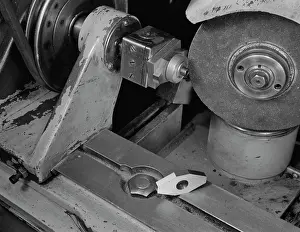 Grinder: A Norton cutter-grinder converted to grind