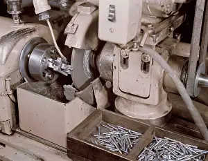 Grinder: A Norton grinder converted to grind spring