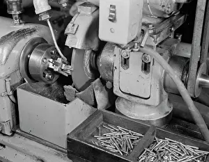 Grinder: A Norton grinder converted to grind spring