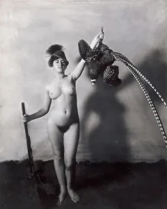 Gamsbart: Nude with shotgun, pheasant and Gamsbart hat
