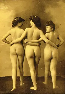 Nudes: Three nude woman with linked arms