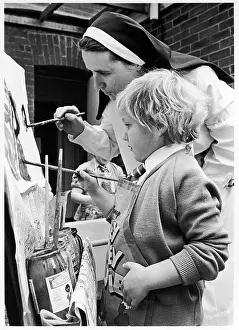 Marmalade: Nun and child painting