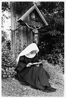 Colin Horsman: Nun reading in garden