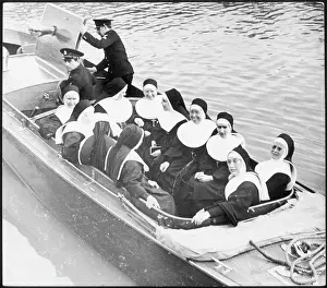 Administer: NUNS IN BOAT