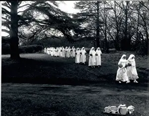 Smoothly: Nuns walking in procession