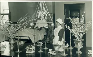 Arrangements: Nurse with Christmas decorations and flowers