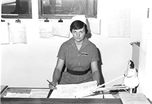 Paperwork: Nurse at desk