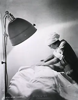 Therapies: Nurse giving back rub to a patient in Walter ?