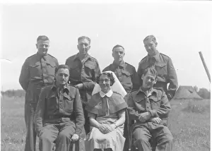 Servicemen: Nurse with group of servicemen