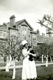 Berks: Nurse holding cat