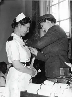 Singleton: Nurse receiving an award