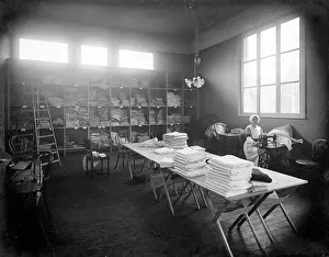 Towels: Nurse at sewing machine in linen room