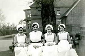 Burke: Nurses on bench outside hospital