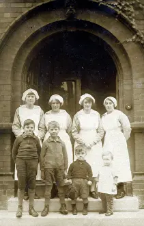 Carers: Nurses and their charges at a Charity Orphanage