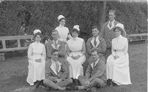 Servicemen: Nurses and convalescing servicemen outside
