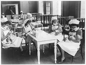 Nursemaids: NURSES FEEDING BABIES