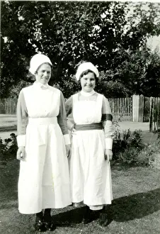 Wellbeing: Two nurses in a garden