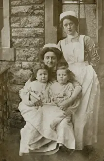 Caring: Nurses with two little girls