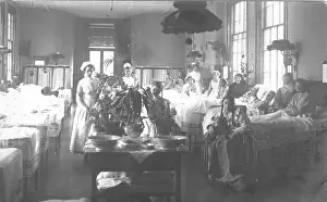 Wheelchair: Nurses and patients in female ward