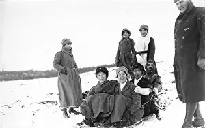 Sledging: Nurses and soldiers sledging during WW1