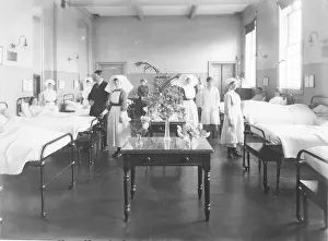 Arrangements: Nurses and staff in female ward