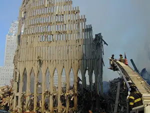Fire Fighter: NYC firefighters in a bucket on an extension ladder