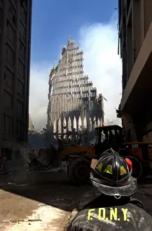 Qaeda: NYC fireman looks up at what remains of the North