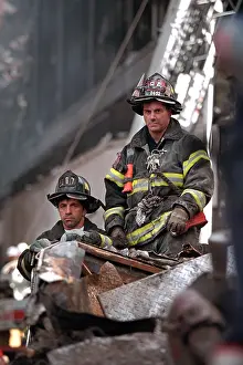 Qaeda: NYC Firemen, grim and geared for rescue/recovery