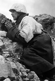 Observer: Observer between debris in Kholm, 1942