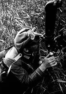 Observer: Observer with a scissors telescope, 1942