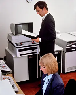 Networking: Office with Early Computer Hardware Woman Seated