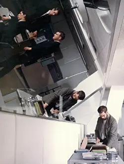 Mirrors: Office scene with large angled mirror