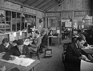 Shared: Office workers at their desk, 1931