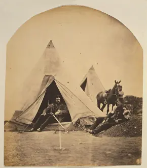 57th: Officer of the 57th Regiment sitting with a sword across his
