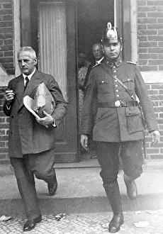 Accompaniment: An official brings ballots to the Town Hall, 1932