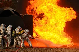 Phelps: Ohio Air National Guardsmen extinguish an ?