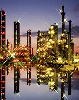 Cracking: Oil Refinery Lights at Twilight