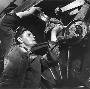 Heinz Zinram: Oiling a Locomotive Wheel and Piston