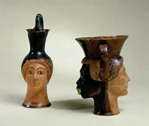Oinochoe: An oinochoe in the shape