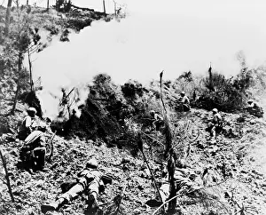 Bitterly: Okinawa. After setting off explosives, Marines ?