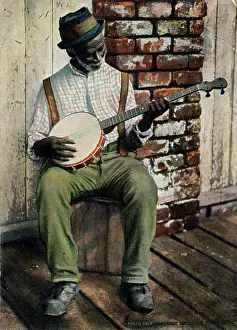 Banjo: Old Black Man playing the Banjo
