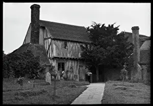 Timbered: Old house with graveyard